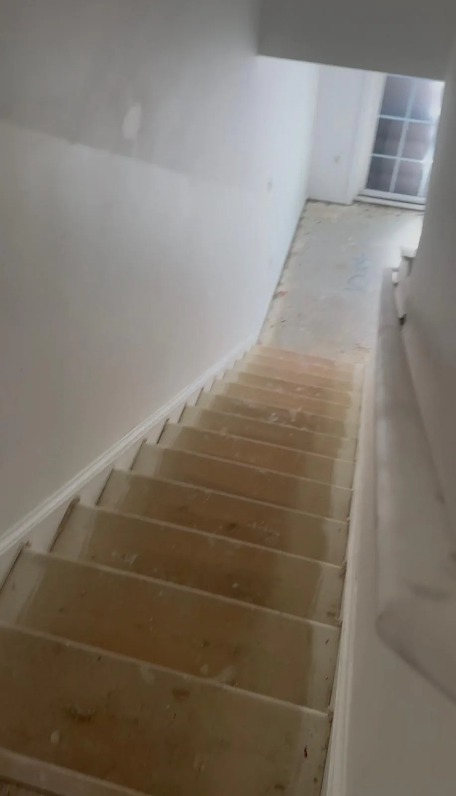 Staircase and hallway before finishing work